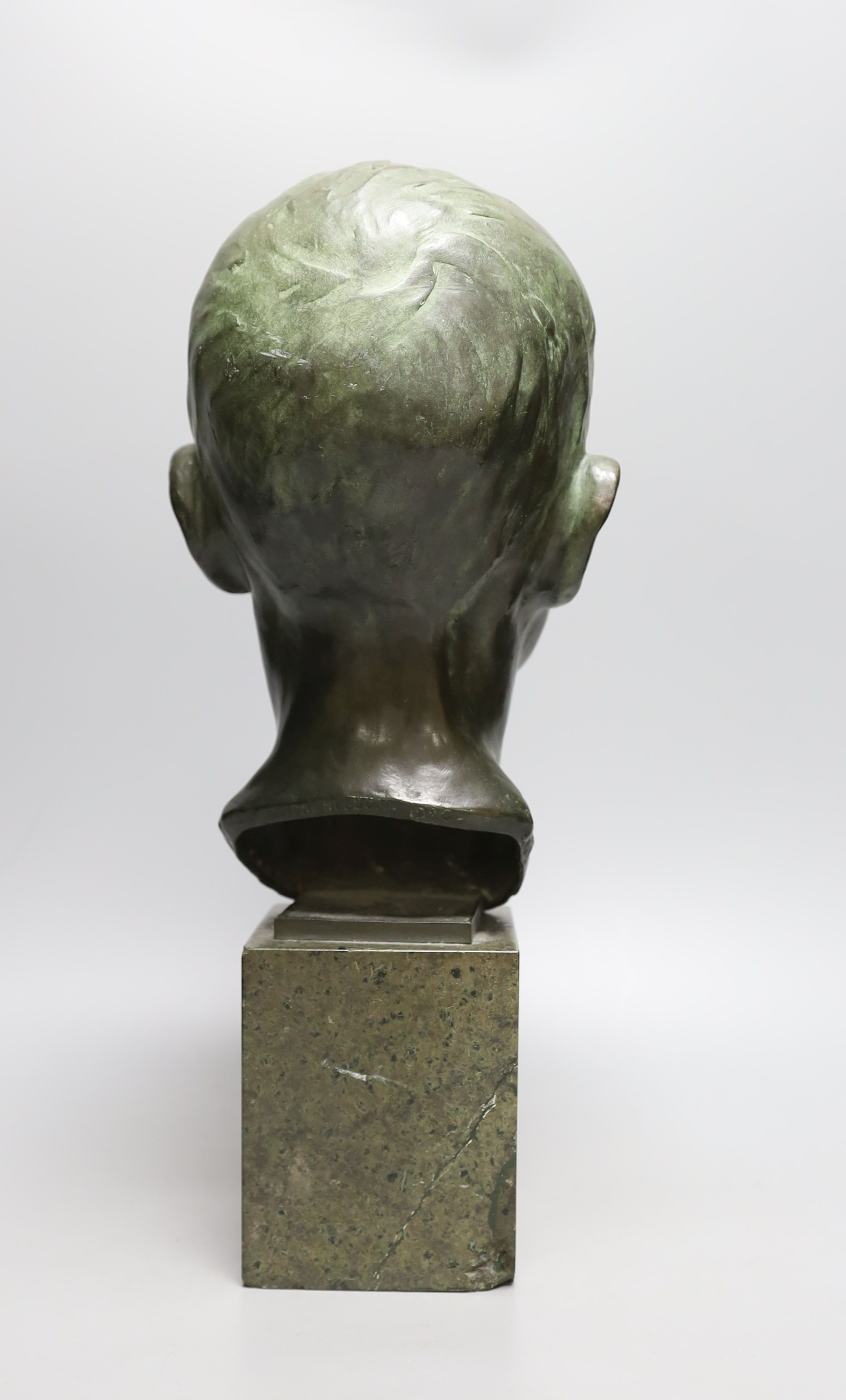 Ida Nelson, a green patinated bronze head of a boy, signed and dated 1926, 42 cms high.